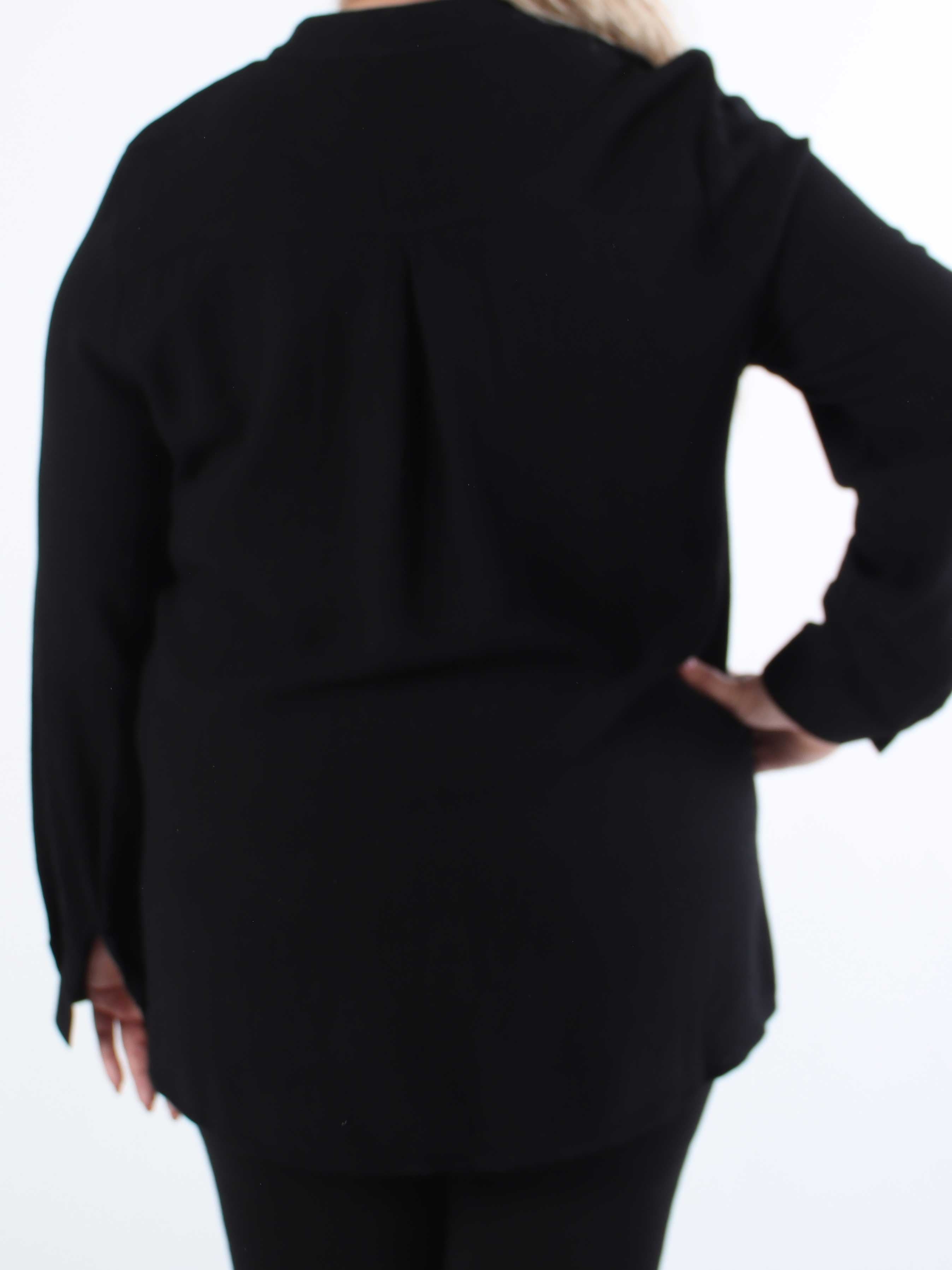 Benna - Ensfarvet tunika lavet i blød viskose